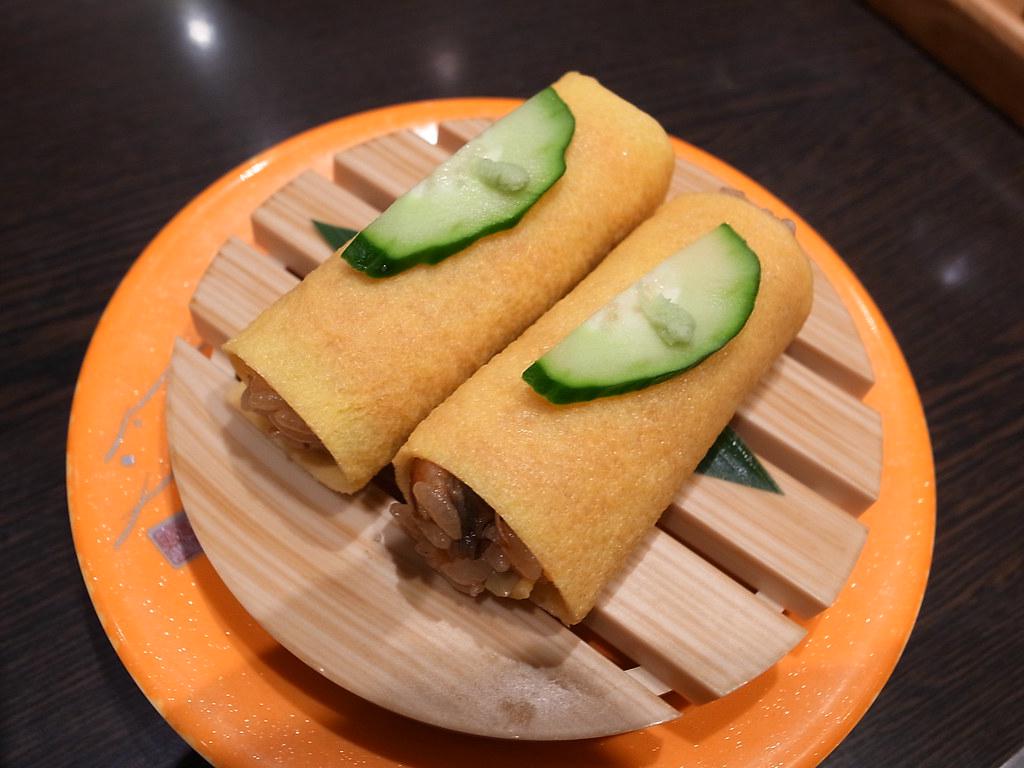 Egg roll sushi rolls on a plate